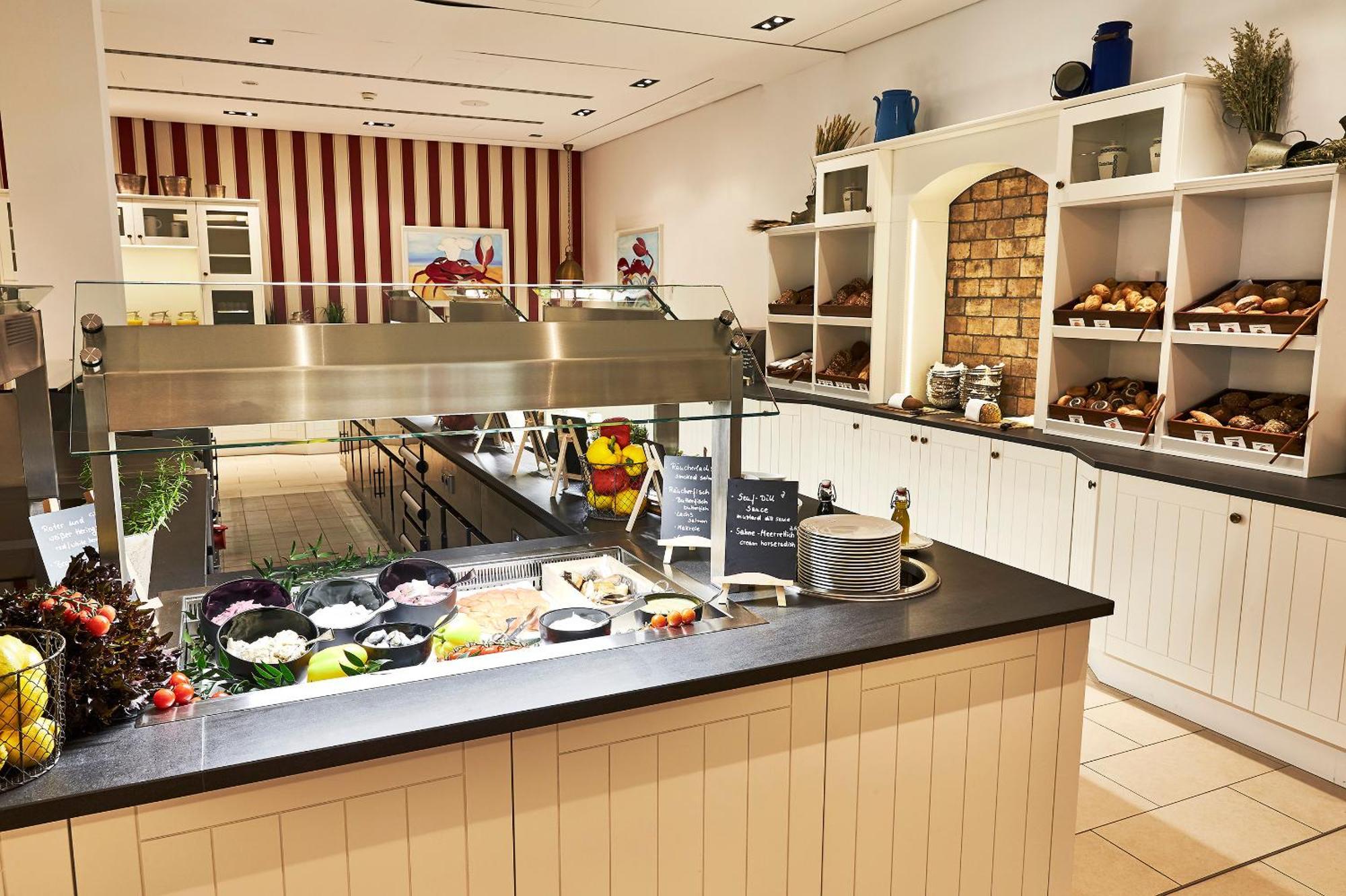 스타이겐베르거 그랜드호텔 앤 스파 헤링스도르프 제바트헤링스도르프 외부 사진 A buffet at a hotel